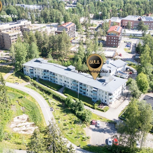 Ilmakuva ja näkymä raitiovaunupysäkille